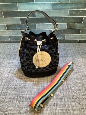 Coach Dempsey Navy Signature Bucket Bag with Tan Accents and Rainbow Strap